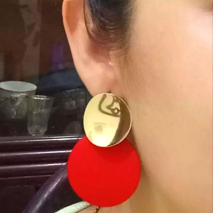 Pretty Gold & Red Disc Earrings Trendy Red Circular Jewelry, Modern Red Round Earrings, Red Metal Earrings For Party, Trendy Red Metal Earrings, Trendy Red Party Earrings, Red Round Metal Earrings, Bold Red Drop Earrings, Trendy Red Earrings For Valentine's Day, Modern Red Earrings For Party