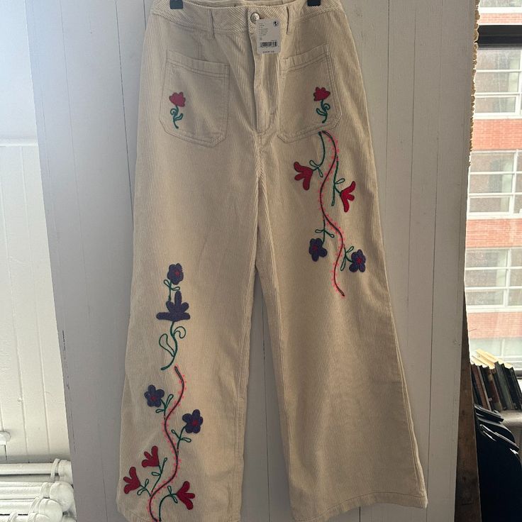 Brand New Free People Floral Embroidered Cord Pants. Never Worn, Tags Still On. Originally $180usd. Size 30 Beige Cotton Pants With Floral Embroidery, Beige Floral Embroidery Pants For Summer, Summer Cream Bottoms With Floral Embroidery, Cream Floral Embroidery Bottoms For Summer, Spring Floral Embroidered Pants, Summer Floral Embroidery Cream Bottoms, Beige Floral Embroidered Pants For Spring, Embroidered Straight Leg Summer Pants, Summer Embroidered Beige Pants