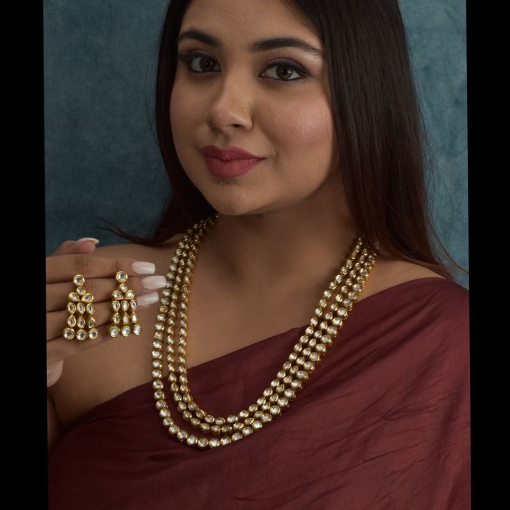 Uncut Polki Kundan Multi-Layer Necklace/Sabyasachi Inspired Jewelry/Gold Plated Jadau Kundan Bridal Long Necklace/Simple Set *PRODUCT DETAIL* * Material: Brass * Plating: Gold Plated * Stone: Semi Precious Kundan *DIMENSIONS * * Necklace- Weight: 191 gm, Length: 2.3 Inches, Width: 1 Inches * Earrings- Weight: 14 gm Each, Length: 1.75 Inches, Width: 1 Inches *ABOUT PRODUCT* * Beautiful Jadau Kundan Necklace Set in Gold Plating. * Style Tip : Exclusive Design to be a star of your collection. *DISC Elegant Temple Jewelry Kundan Necklace, Bridal Necklace With Jewels For Celebration, Bridal Jeweled Necklace For Celebration, Elegant Chandbali Necklaces With Jewels, Elegant Hand-set Kundan Necklace For Festivals, Luxury Kundan Necklace For Festive Party, Elegant Kundan Jewelry Sets, Elegant Festive Kundan Necklace With Jewels, Luxury Kundan Necklace For Party And Festive Occasions