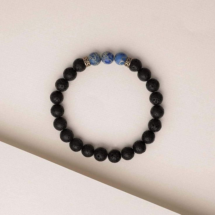 Benefits The Blue Regalite Himalayan Stone Bracelet includes both Lava Stone beads and Blue Regalite beads. Blue Regalite is a grounding, strengthening stone that promotes stability, clarity, and inner-peace, making it ideal for encouraging compassion, contentment, and tranquility. The lava stone also known as “basalt” is a porous volcanic rock that has been solidified from molten lava after conditions of intense heat and pressure. Materials We carefully design, test and ensure the quality of ou Minimalist Round Beads Bracelets For Meditation, Minimalist Gemstone Beads Bracelets For Meditation, Minimalist Bracelets With 8mm Beads For Healing, Minimalist Gemstone Beaded Bracelets For Healing, Minimalist Gemstone Beaded Bracelets For Meditation, Lapis Lazuli Beaded Bracelets For Healing, Minimalist Healing Bracelets With Natural Stones, Minimalist Natural Stones Bracelets For Healing, Minimalist Round Beaded Bracelets For Healing