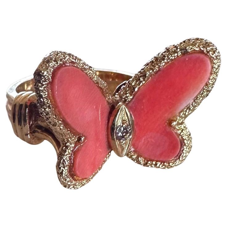 A beautiful Vintage 18k Yellow gold Coral Motif Butterfly Ring by Van Cleef & Arpels. The ring is set with a centre butterfly motif of Coral inlay that is further complemented by a beaded outer edge. The Butterfly measures 16mm in height and 22mm in width and sits on a band that tapers from 3mm wide to 2mm. The ring is a size 5 and has a gross weight of 7.2 grams. Comes complete with a Van Cleef & Arpels presentation box Makers Hallmarks VCA Numbered and 18K Coral Butterfly, Van Cleef And Arpels Jewelry, Butterfly Motif, Van Cleef And Arpels, Butterfly Ring, Van Cleef Arpels, Van Cleef, The Butterfly, The Ring