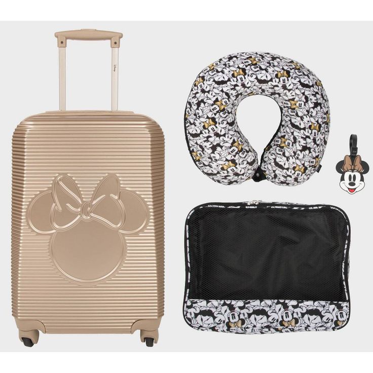 Embark on a Disney adventure with the luggage set featuring a gold suitcase with an image of Minnie’s mouse ears and bow, a matching ID-Tag with Minnie’s face, and a neck pillow and packing cube with all-over print of Minnie Mouse. The rolling suitcase removes the need for heavy lifting while the zippered packing cube can store smaller items. The neck pillow’s plush memory fabric will keep you comfy and relaxed on your travels. Minnie Mouse Suitcase, Disney Suitcase, Disney Luggage, Disney Trip Outfits, Hardside Luggage Sets, Disney Cruise Vacation, Disney Products, Cute Suitcases, Cute Disney Outfits