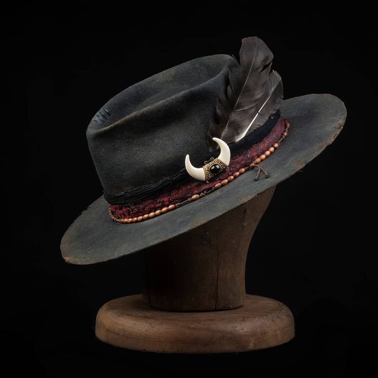 The Bandit Drifter is a 100% Wool Felt, Western high quality hat. Thick and durable and made to last a lifetime.Distressed fabric band with multiple layers of leather cord. The inside has a comfortable leather sweatband with a satin liner.Handmade, one of a kind from GrimHat.The size of the hatis based on the circumference of the head.In order to determine the proper hat size, you must measure your head.Use the table below to determine your hat size based on your measurements.Worldwide Shipping Brown Waxed Finish Hats, Brown Waxed Brimmed Hats, Rustic Adjustable Fedora With Flat Crown, Rustic Adjustable Brown Top Hat, Rustic Adjustable Brimmed Top Hat, Adjustable Rustic Fedora Hat, Adjustable Rustic Fedora, Rustic Top Hat With Adjustable Flat Brim, Rustic Adjustable Short Brim Hat