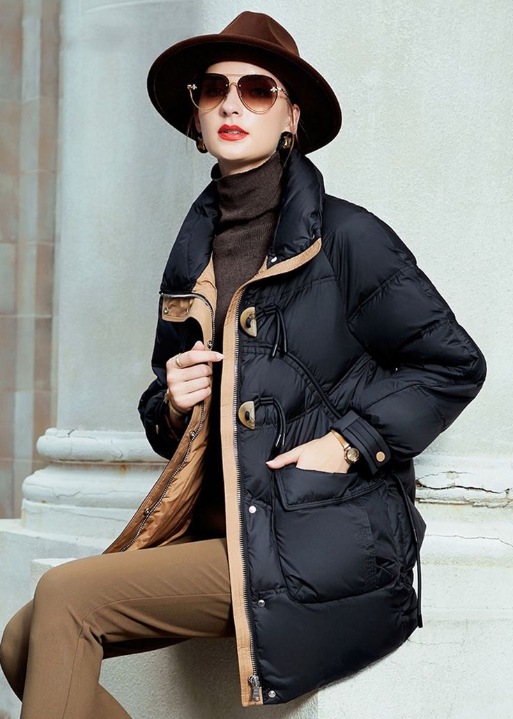 Our luxurious duck-down jacket will have you looking chic and feeling comfortably cozy through winter. Crafted from plush white duck down, your jacket can be worn dressed up or dressed down with its classic silhouette that is sure to flatter any figure. You'll be sure to stay warm and stylish in this timeless staple.Details & care Stand collar Front toggle and button closure Hidden front zip closure with snap storm placket Lined, with 90% duck down, 10% feather fill Polyester Dry clean Women's c Fall Solid Color Duck Down Puffer Jacket, Duck Down Outerwear For Fall And Winter, Winter Duck Down Outerwear With Padded Collar, Duck Down Puffer Outerwear For Fall, Duck Down Puffer Jacket For Fall Winter, Winter Quilted Duck Down Jacket With Padded Collar, Duck Down Quilted Jacket With Padded Collar, Fall Duck Down Puffer Jacket With Pockets, Fall Duck Down Outerwear With Pockets