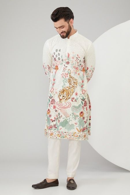 Luxury Motif Kurta For Wedding, Luxury Men's Floral Embroidered Kurta, Luxury White Kurta With Floral Embroidery, Luxury Ceremonial Kurta With Naqshi Embroidery, Luxury Wedding Kurta With Resham Embroidery, Luxury White Kurta With Printed Motifs, Luxury Resham Embroidery Kurta For Wedding, Luxury White Unstitched Suit With Digital Print, Luxury White Kurta With Geometric Embroidery