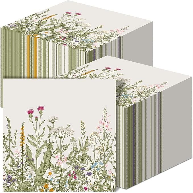 two cards with flowers and stripes on the front one is white, the other is green