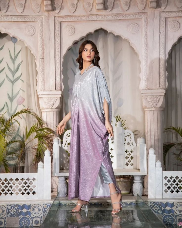 The MOONLIGHT - 2 Piece Kaftan is a must-have for any formal occasion. With its blingy design and sequence fabric, this kaftan is perfect for adding a touch of glamour to your evening look. Plus, it's perfect for night photography, making it a versatile and stylish choice. Fabric: Moonlight Includes: Kaftan and trousers  Length: 52"-53" Model's height: 5'8 ***PLACE YOUR PRE-ORDERS BY 29TH MARCH 2024 FOR GUARANTEED DELIVERY BY EID*** #readytowear #Pakistaniwedding #Pakistanibride #Moder... Kaftan Party Wear, Moonlight Dress Design Pakistani, New Kaftan Designs, Latest Kaftan Designs, Kaftan Dress Modern, Modern Kaftan, Sequence Fabric, Dress Design Pakistani, Pink Kaftan