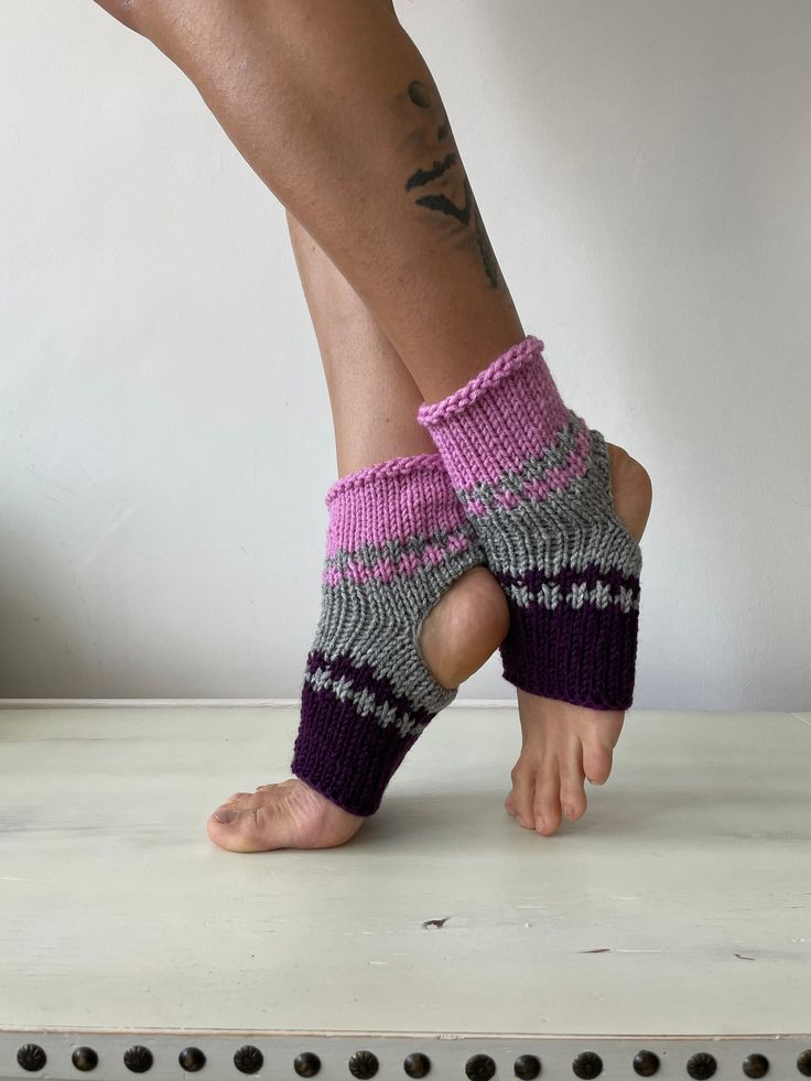 Knitted ankle warmers for yoga, pilates or dancing. Great gift idea for the yoga lover in your life. Hand knitted with love and attention to details! Ready to ship! SIZE Width: 3.9'' (10cm) Length: 7.8'' (20cm)   MATERIALS 50% Natural Wool 50% Acrylic CARE INSTRUCTIONS Hand wash in cold water with neutral soap or use special wool detergent. Do not use a washing machine or a dryer. After carefully washing, reshape and lay out flat to dry. SHIPPING We ship our items the next day after your order. Comfortable Flexible Socks For Pilates, Comfortable Footless Yoga Socks, Footless Leg Warmers For Yoga In Winter, Stretchable Knitted Footless Socks, Stretch Knitted Footless Socks, Knitted Footless Stretch Socks, Knitted Stretch Footless Socks, Yoga Socks Knitting Pattern, Ankle Warmers