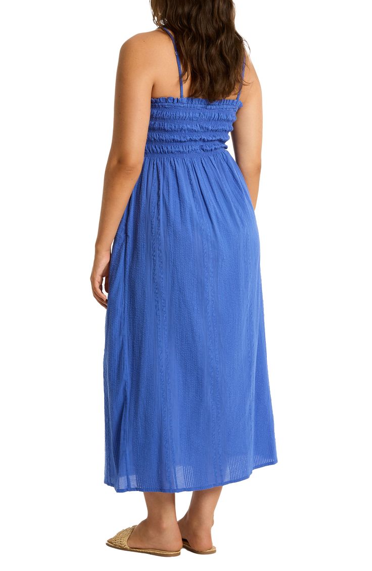 This strapless cover-up dress is crafted of from cotton and designed with a smocked bodice that leads to a flowy skirt. 44" center front length (size Medium) Slips on over head Strapless Smocked bodice 100% cotton Hand wash, dry flat Imported Casual Bandeau Dress With Ruched Detail, Casual Ruched Bandeau Dress, Strapless Smocked Bodice Sundress For Beach, Strapless Sundress With Smocked Bodice For Beach, Strapless Sundress With Smocked Bodice For Vacation, Strapless Vacation Dress With Smocked Back, Strapless Dresses With Smocked Back For Vacation, Casual Smocked Back Tube Top For Beach, Casual Beach Tube Top With Smocked Back