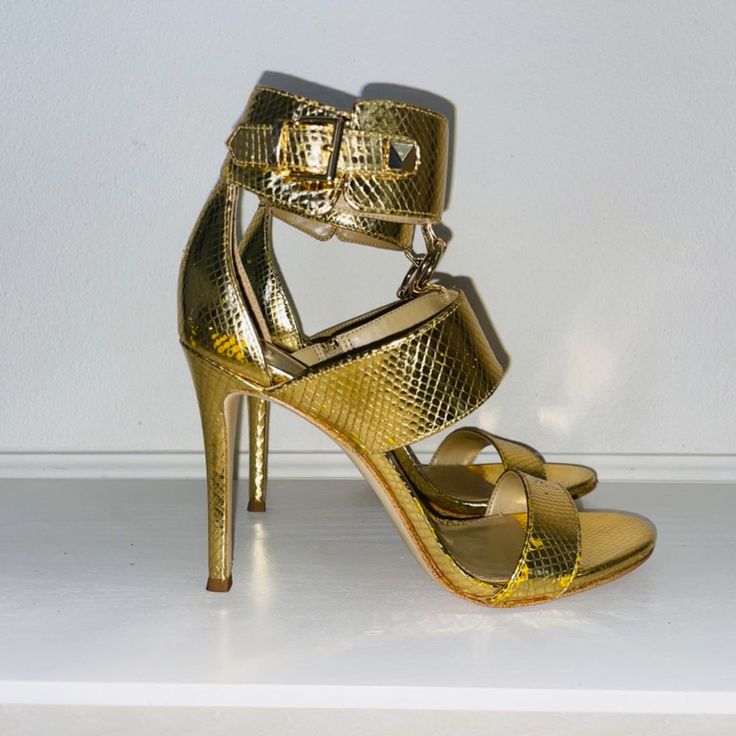 Michael Kors Metallic Snake Embossed Leather Sandal High Heel Size 7.5 Never Worn Gold Ring Front With Stud Ankle Strap Gold Ankle Strap Heels With Buckle Closure, Gold Open Heel Heels With Buckle Closure, Gold Leather Sandals For Night Out, Gold Leather Heels With Buckle Closure, Gold Open Toe Heels With Buckle Closure, Gold High Heel Shoes With Strap, Spring Gold Heels With Strap, Michael Kors Gold Heels For Party, Michael Kors Gold Party Heels