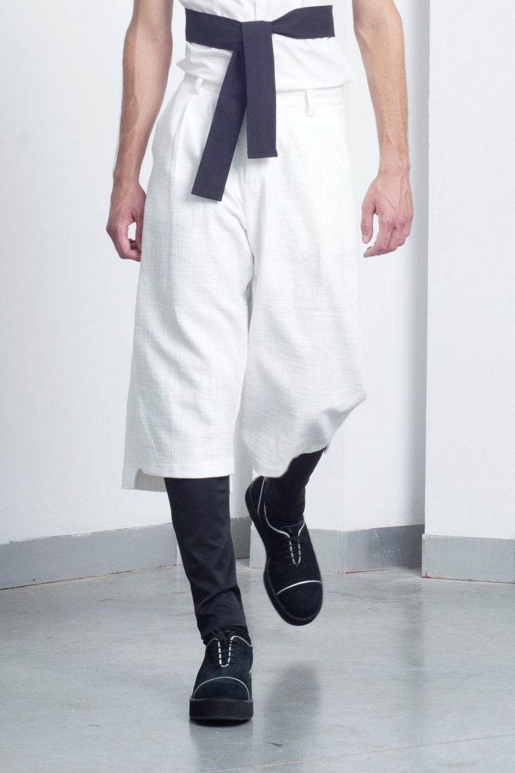 Mens shorts // Mens tailored white stone bermuda shorts by Eliran Nargassi have a oversized silhouette through the body and a minimalistic Japanese design, crafted in a high quality Italian linen fabric, the shorts features a unique hem (the back hem is longer than the front hem), there are 2 pockets at the front and 2 welt pockets at the back, also features a zip fastening fly, a single button and belt loops. The matching shirt can be found here: www.etsy.com/listing/237941178/ WE SHIP WORLDWID Spring Baggy Knee-length Bottoms, Summer Cotton Bermuda Pants, Summer Bermuda Cotton Pants, Baggy Knee-length Summer Pants, White Wide-leg Shorts With Pockets, White Wide Leg Shorts With Pockets, White Bermuda Shorts With Pockets For Summer, Baggy White Bottoms For Summer, Summer Cotton Knee-length Shorts