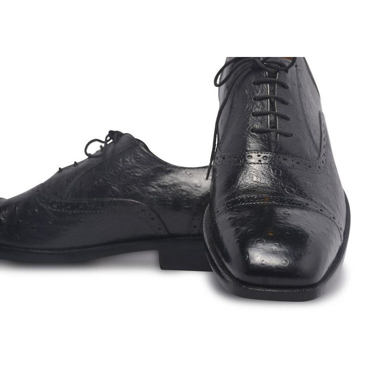 When it comes to achieving a perfect business-like persona, one of the most significant accessories is the shoes. These black leather shoes are the right choice for all the reasons. Firstly, the beautiful handiwork on the exterior gives them a unique touch. Secondly, being black, these shoes are as versatile as they get. Here’s a lot more about these brilliant men’s black Brogue Oxfords by the LeatherSkin Shop. Genuine leather official black formal shoes with a flexible style and design that only adds to the aura. Shiny wrinkled exterior with immaculate finishing paired with a classy light brown interior for amazing looks. Padding and lining are done on the insole while black expert threading visible on the exterior only adds to your style quotient. The central lace-up system is quite prac Italian Cap Toe Oxfords For Office, Luxury Snip Toe Dress Shoes, Formal Italian Wingtip Lace-up Shoes, Italian Wingtip Lace-up Shoes For Formal Occasions, Luxury Leather Shoes With Snip Toe, Elegant Plain Toe Lace-up Shoes With Rubber Heel Cap, Luxury Wingtip Dress Shoes For Galas, Elegant Lace-up Shoes With Rubber Heel Cap, Luxury Wingtip Lace-up Shoes For Galas