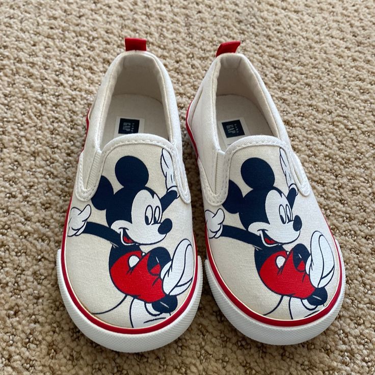 Gap Disney Collaboration Mickey Kids Slip On Shoes. Brand New Never Worn Without Tags Disney Character Print Sneakers With Round Toe, Fun Sneakers With Character Print And Round Toe, Fun Slip-on Sneakers For Playtime, Disney White Sneakers With Mickey Mouse Detail, Disney White Sneakers With Mickey Mouse, Disney Mickey Mouse Low-top Sneakers, White Disney Mickey Mouse Sneakers, Disney White Mickey Mouse Sneakers, Fun Cartoon Print Sneakers With Round Toe