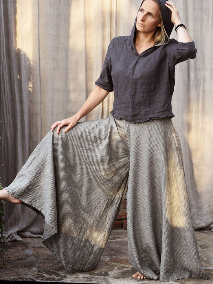 "Linen skirt-pants. Cut from a circle segment. Airy, wide legs and a slim top, freely fitted, tightened with an elastic at the waist. Two side pockets. Boho style, for free and artistic souls. Sewn with a French seam. The model is 170 cm tall and wearing skirt-trousers 95 cm long, lowered at the hips. DETAILS: - 100% linen, light and soften  - Includes one linen pair of trousers  - Pockets on the sides - Elastic waistband - Shrinkage after the first wash up to 3% SIZES: Small :        Elasticate Non-stretch Linen Harem Pants For Spring, Non-stretch Wide Leg Summer Culottes, Summer Wide Leg Non-stretch Culottes, Summer Stretch Wide-leg Culottes, Baggy Flax Bottoms For Spring, Non-stretch Linen Wide Leg Pants For Spring, Casual Wide Hem Spring Pants, Casual Wide Hem Pants For Spring, Fitted Wide Leg Pants For Summer