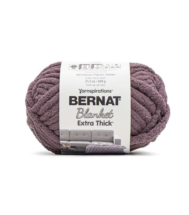 bernat extra thick yarn ball in purple, on a white background with the label