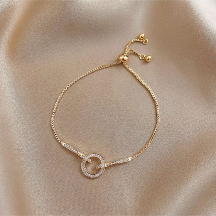 This Elegant Piece Is For You To Stay. It's Available In Gold Only. It Has Beautiful Diamond Stone That Will Make You Stand Out. This Forever Bracelet Can Be A Gift To A Special Person Or For You That Well Deserve It. Adjustable Gold Crystal Chain Bracelet, Gold Crystal Chain Bracelet, Trendy Round Charm Bracelet With Adjustable Chain, Elegant Circular Chain Jewelry, Metal Crystal Bracelet With Chain As A Gift, Elegant Adjustable Crystal Bracelet With Chain, Metal Crystal Bracelet With Adjustable Chain As Gift, Everyday Gold Round Crystal Bracelet, Trendy Gold Bracelet As Gift