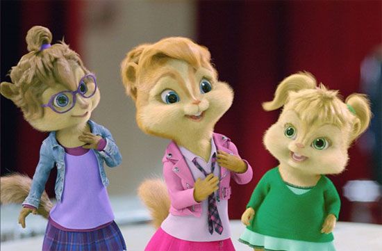 three figurines of chipmuns are standing next to each other