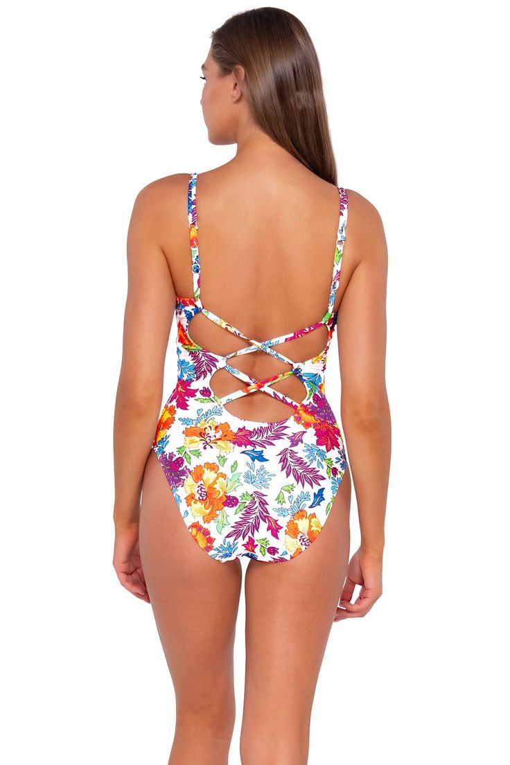 A sleek little one-piece is always the right answer. Our Veronica One Piece is perfect for lying by the pool or diving in; you'll want to take this bad boy on every summer trip. Featuring a double crossback, adjustable straps, and a low V-neck. Other features include a hidden shelf bra with picot elastic, removable cups, a J-hook that enables the straps to convert to a crossback, and matching lining. Adjustable One Piece: A classic one-piece with options to maximize your support and fit. Find Yo One-piece Swimwear With Adjustable Straps For Beach Season, Beach Season One-piece Swimsuit With Adjustable Straps, Beach Season One Pieces With Adjustable Straps For Poolside, White Strappy Back Swimwear For Poolside, White Swimwear With Crisscross Straps For Vacation, White Strappy Back Swimwear For Summer, Beachwear One Piece With Adjustable Straps For Pool, White Crisscross Strap Swimwear For Vacation, Beachwear One-piece Swimsuit With Adjustable Straps