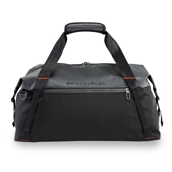 This duffle delightfully delivers custom carrying options. Pack it out with all your needs or cinch it down when carrying just your basics. As a carry-on, weekender, or gym bag, the Cargo Satchel has the versatility, and capacity, to meet all your needs. Complimentary monogramming is offered on ZDX purchases. Please allow 3-5 business days for production. Height Width Depth Weight US 13.25" 22.25" 12" 2.1 lbs EU 33.8 cm 30.5 cm 56.6 cm .9 kg INTERIOR FEATURES SpeedThru™ pocket for quick storage Weekend Duffle Bag, Carry On Size, Sac Lunch, Personalized Backpack, Travel Duffle, Weekender Bag, Duffel Bag, Satchel Bags, Travel Accessories