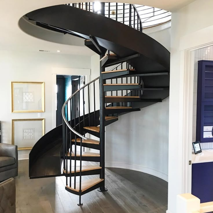 there is a spiral staircase in the living room