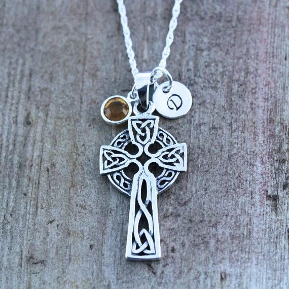 "This sterling silver light this Celtic Cross knot necklace is not just beautiful in design but also in meanings, this pendant is a symbol which emphasizes the endlessness of love of God shown through the sacrifice of Jesus on the Cross. The Celtic knot at the bottom of the cross represents friendship, affection, that cannot be broken. Also It represent the three promises of a relationship such as to love, honour, and protect; emphasizes the unity of the whole combination of the three elements. Cross Necklace With Charms For Gifts, Cross Shaped Charm Necklace For Gifts, Cross Charms Necklace For Gifts, Cross Charm Necklaces For Gifts, Sterling Silver Charm Necklace With Cross Pendant, Personalized Sterling Silver Pendant Cross Necklace, Personalized Sterling Silver Cross Pendant Necklace, Silver Cross Necklace With Charms, Cross-shaped Birthstone Necklaces As Gifts