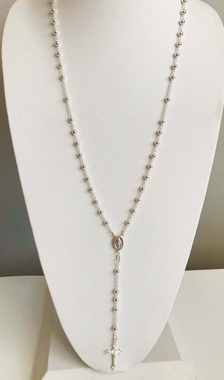 "Miraculous virgen 925 sterling silver italian rosary 30\" long . for protection and good luck , wedding, communion. made in italy 5 mm beads gr: 26 rosario de plata esterlina de la virgen de la milagrosa 925 silver, 30\" largo . para proteccion y buena suerte . hecho en italia 5 mm beads gr: 26" Silver Rosary With Miraculous Medal And Round Beads, Silver Spiritual Rosary, Silver Round Rosary For Spiritual Use, Silver Spiritual Necklace With 8mm Beads, Silver Spiritual Jewelry With 8mm Beads, Spiritual Silver Jewelry With 8mm Beads, Silver Spiritual Necklaces With 8mm Beads, Silver Necklaces With 8mm Sterling Silver Beads, Sterling Silver Cross Rosary In Silver