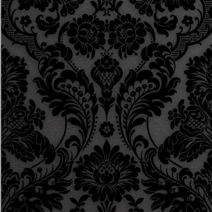 a black and white wallpaper with an ornate design