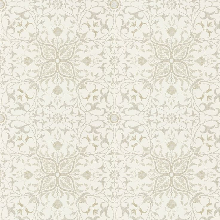 a white and beige wallpaper with an intricate design