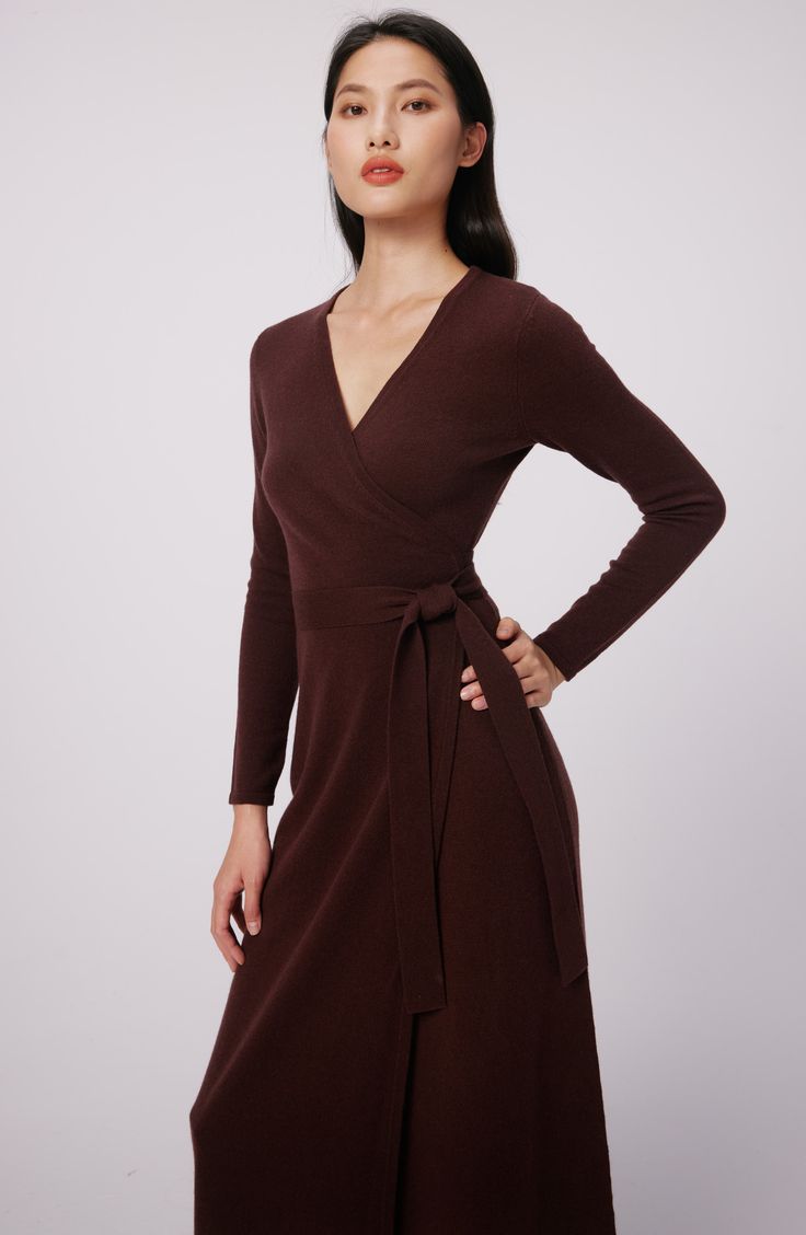 This quintessential wrap sweater-dress knit from luxe wool and cashmere features a sultry dipped neckline and waist-cinching sash. Surplice V-neck Long sleeves 70% wool, 30% cashmere Dry clean Imported Brown Fitted V-neck Wrap Dress, Formal Fall V-neck Wrap Dress, Elegant Brown Fitted Sweater Dress, Elegant Brown V-neck Sweater, Fitted Cashmere Sweater Dress For Fall, Winter Cashmere Sweater Dress For Work, Fitted Wool V-neck Dress, Fitted Wool V-neck Sweater, Fitted V-neck Cashmere Sweater