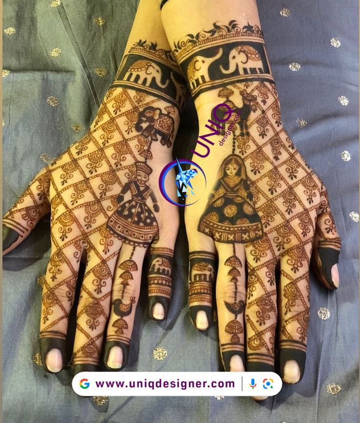 two hands with henna designs on them