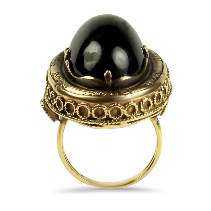 This 14K Yellow Gold Victorian Hair & Garnet Cabochon Ring is a stunning example of Victorian mourning jewelry. It features a 23x14mm garnet cabochon, weighing an estimated 36 carats, elegantly bezel set in an engraved and milgrained ring mounting. The closed back of the ring reveals framed woven hair, a traditional element of mourning pieces from the Victorian era. The ornate frame measures 31x22mm, complemented by a polished 2mm shank. This ring is size 6.5 and tested to be 14k gold. Please no Elegant Formal Cabochon Ring, Elegant Domed Jewelry With Bezel Setting, Gold Dome Ring With Cabochon For Formal Events, Luxury Domed Signet Ring For Formal Occasions, Luxury Cabochon Jewelry For Formal Occasions, Luxury Formal Jewelry With Cabochon, Elegant Domed Cabochons For Gifts, Oval Yellow Gold Cabochons For Formal Events, Formal Yellow Gold Cabochons With Bezel Setting