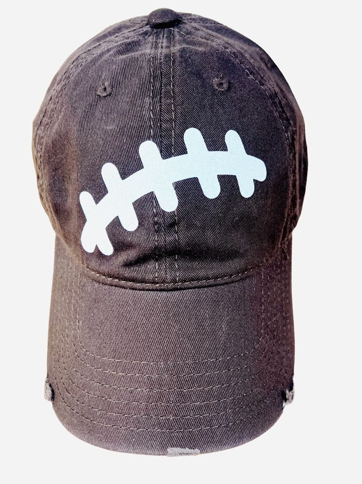 PLEASE READ:  This design ships in 3-5 working days Please review all pictures and listing details/options here: STANDARD DESIGN DESCRIPTION: **Solid brown full fabric adjustable closure hat ** football laces design on front **Back of hat is full fabric with adjustable closure.  Football design and rhinestones on the closure OPTIONAL! ** Add a number or Mom to the bill of your hat! SIZING & FIT: **This is an adult size hat and "fits most".  **It has an adjustable closure on back. **Runs average size SHIPPING: **All orders are shipped USPS Ground Advantage Mail, which should arrive 2-5 days from ship date.  Need it sooner?  You may upgrade to Priority or Express mail.  **Your hat will arrive in a brown box. WANT FREE SHIPPING? Orders $35+ ship free! Check out my JEWELRY section and add a cu Brown Hats For Baseball Season Sports Events, Brown Baseball Cap For Baseball Season, Game Day Cap For Football Season, Customizable Casual Baseball Cap For Sports, Customizable Casual Baseball Cap For Sports Events, Casual Customizable Brown Hat, Personalized Casual Baseball Cap For Sports Events, Sports Fan Hats For Football Season Game Day, Customizable Casual Baseball Cap For Game Day