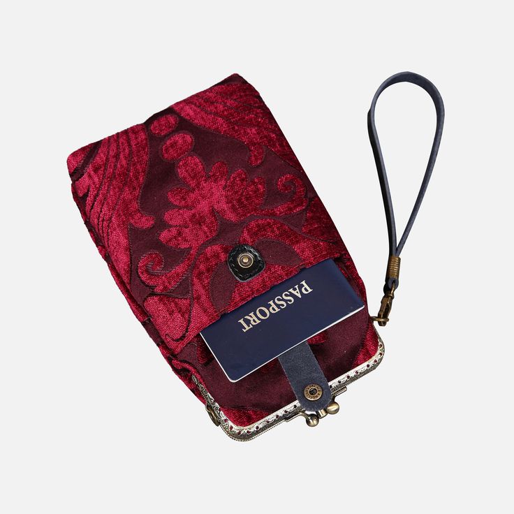 With a nod to the Victorian era, MCW’s freshly combines the classic and elegant design of the traditional carpet bag with a textural and tactile twist.The main body of the functional phone case is made with rich chenille carpet, cotton floral canvas, and brass clasp with double kiss lock. With the width 4.15" and height 8.60" it can easily hold phones of any sizes (max phone width to 4"), with the leather wrist strap that comes with the bag. There are two mini rings at both sides of the clasp an Vintage Phone Bag With Removable Pouch For Travel, Vintage Wallet With Removable Pouch For Travel, Vintage Travel Phone Bag With Removable Pouch, Vintage Rectangular Phone Bag With Removable Pouch, Vintage Phone Bag With Removable Pouch, Vintage Phone Bag With Cell Phone Pocket For Travel, Vintage Phone Bag For Travel, Vintage Travel Phone Bag With Cell Phone Pocket, Victorian Carpet