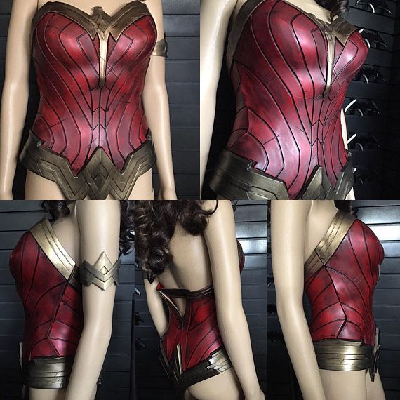 the back of a woman's body wearing a red and gold corset