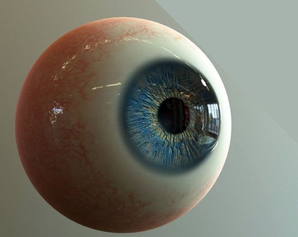 an eyeball with blue and red speckles on it