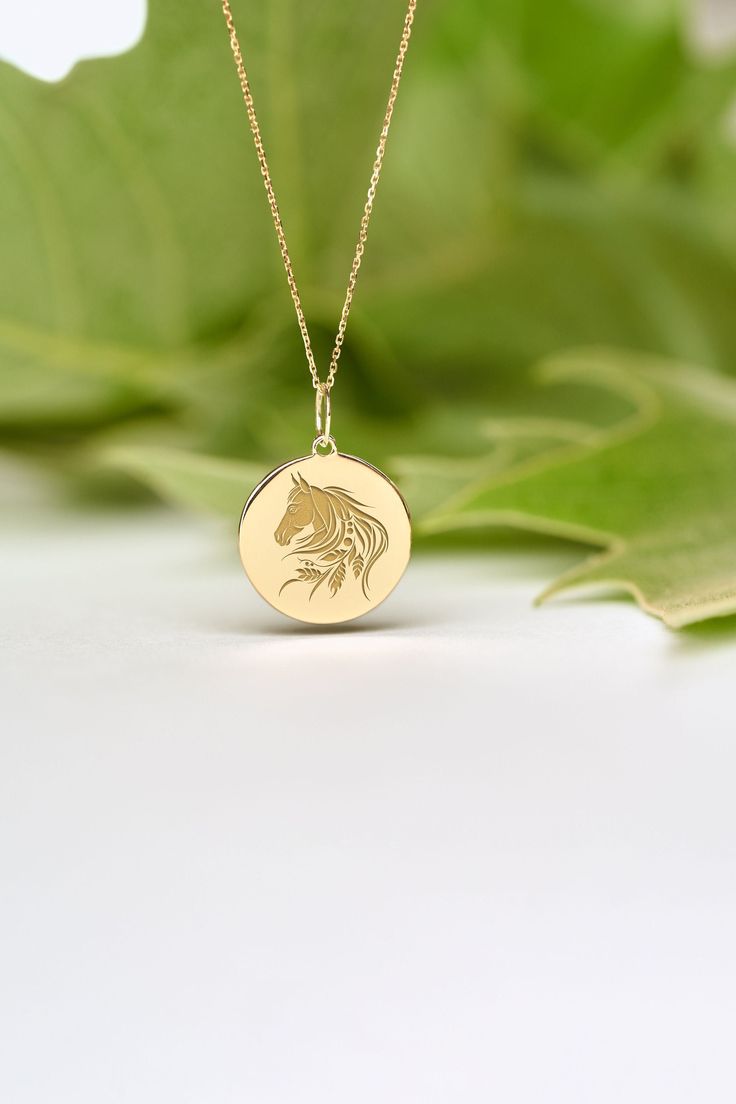 If you wish we can personalize your 14k Solid Gold Horse Necklace. A Dainty and unique gift for Birthdays, Graduations, Weddings and Anniversaries. ● MATERIAL 14k SOLID GOLD ● Chain Length or Without Chain - Without Chain - 40 cm / 16 inches - 45 cm / 18 inches - 50 cm / 20 inches ● PENDANT SIZE [The jump ring (bail) is not included in the measurements] - 13 mm / 0.51 Inches diameter - 14 mm / 0.55 Inches diameter - 15.3mm / 0.6 Inches diameter - 16.5mm / 0.65 Inches diameter - 19 mm / 0.75 Inch Personalized 14k Gold Jewelry For Keepsake, Personalized 14k Gold Keepsake Jewelry, Engraved 14k Gold Charm Necklace For Anniversary, Custom Round Pendant Necklace With Charms For Gift, Customizable Medallion Necklace For Keepsake, Customizable Medallion Jewelry For Anniversary, Symbolic Round Pendant Necklace For Personalized Gift, Wedding Charm Necklace In 14k Gold Engraved, Customizable Yellow Gold Charm Necklace For Gift