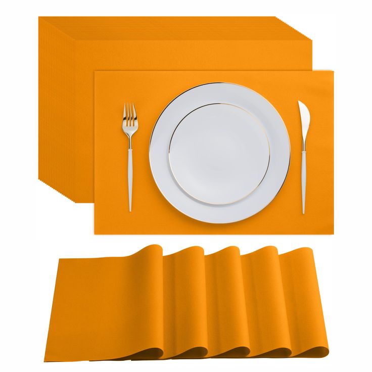 the place setting is ready to be served with orange napkins and gold cutlery