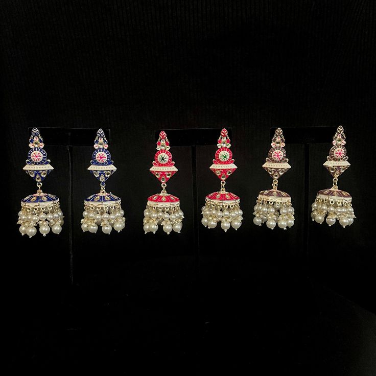 Meenakari Jhumka Earrings | Statement Earrings | Polki Jewelry | Kundan and Pearl Jhumka Colors Available:  Pink, Purple & Blue Details:  Earring Length: 8.50 CM x Width: 2.50 CM Metal: Alloy With Good Quality Gold Plated Color: Maroon | Stone: Kundan & Imitation Pearl Gross Weight: 43.00 Grams Back Finding: Post With Friction Back x Earring Style: Jhumka ** This is 100% Handmade jewelry! All photos and videos are taken in natural light without editing on a standard jewelry display. Please expec Meenakari Bridal Earrings For Puja, Bridal Meenakari Earrings For Puja, Fusion Style Earrings For Diwali Puja, Festive Fusion Earrings For Puja, Fusion Chandbali Earrings For Puja, Fusion Style Earrings For Puja And Festivals, Fusion Style Chandbali Earrings For Puja, Kundan Earrings For Puja, Meenakari Earrings For Navratri Puja