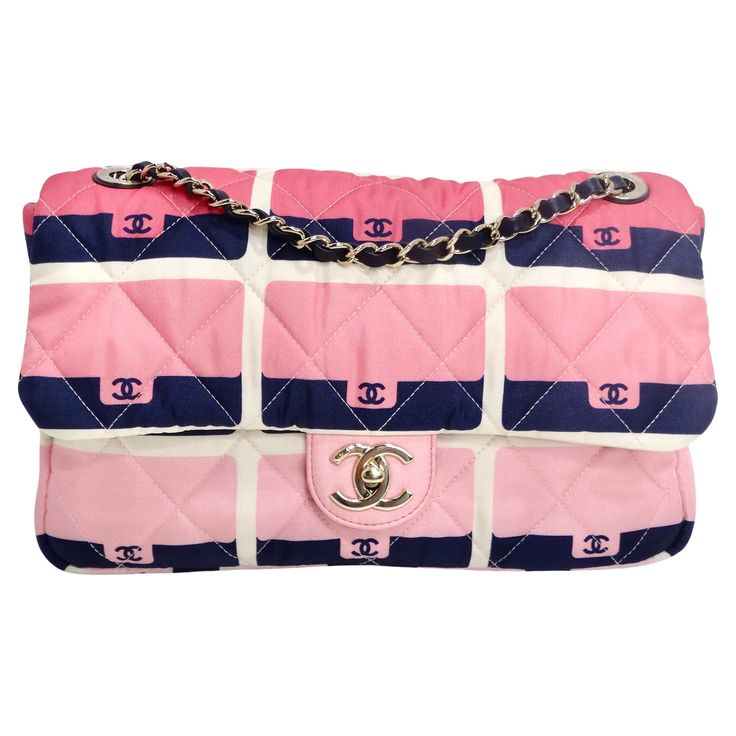 Introducing the Chanel 2021 Jumbo Print Graphic Pink Black Quilted Flap Shoulder Bag – a whimsical and vibrant addition to your collection. This classic Chanel Flap bag features a playful gradient pink and navy print adorned with images of Chanel flap handbags, adding a touch of whimsy to the iconic design. Crafted with Chanel's signature attention to detail, this shoulder bag boasts gold-tone hardware, including the signature Chanel interlocking 'C' turn lock, for a touch of luxury. The navy leather intertwined with the chain strap adds a sophisticated contrast to the colorful print. Opening up to a light pink interior with a zip pocket, this bag offers practicality alongside its striking design. Perfect for collectors and fashion enthusiasts alike, this bag is a fun and playful statement Chanel Graffiti Bag, Chanel 2021, Imvu Outfits, Imvu Outfits Ideas Cute, Gucci Boots, Classic Chanel, Navy Print, Chanel Flap Bag, Flap Shoulder Bag