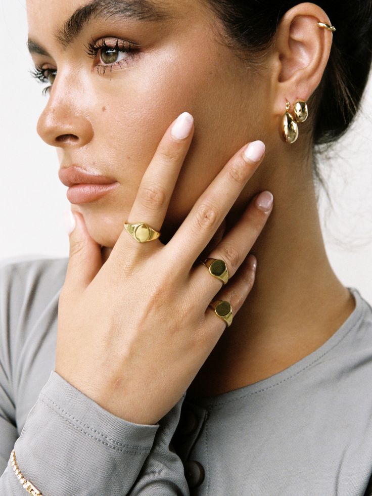 The 14k Gold Filled Signet Ring is our modern take on the classic signet style that has been around for decades. A perfect statement ring, or addition to your pinky, our 14k Gold Filled Signet Ring will become an heirloom in your capsule collection. Details 14k Gold Filled Available in 5 sizes Can be engraved Please note that as all items are handmade to order, please allow for 1-3 days of handcrafting before despatch. However, if you wish to have your item fast-tracked, please email us at contact@loveisabelle.com where we will be more than happy to assist you. If purchasing more than one item, and require individual boxes for your jewellery, you can purchase them here. Timeless Everyday Initial Ring, Timeless Signet Ring With Thick Band, Everyday 14k Gold Open Ring Jewelry, Classic Rose Gold Initial Ring For Everyday, Timeless Everyday Yellow Gold Initial Ring, Everyday Heirloom Style Gold Plated Rings, Everyday Tarnish Resistant Initial Ring, Classic Gold Initial Ring For Everyday, 14k Gold Tarnish-resistant Midi Rings