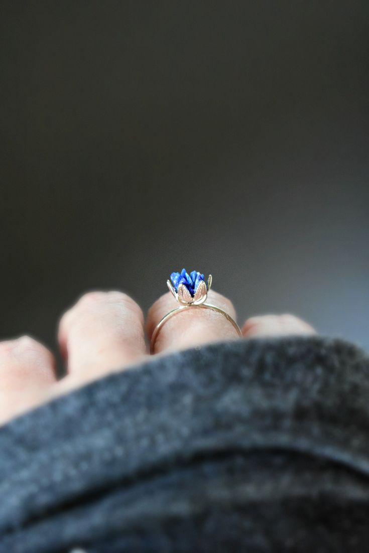 Lapis Lazuli ring with deep blue gemstones that makes a statement. My Lotus Flower ring design with blue and sterling silver is perfect for so many gift giving occasions: stone anniversary them gift for wife, unique Mother's Day jewelry and so many more. This is my copyrighted signature design and is available as a made to size ring. Scroll to read more about Lapis Lazuli... More gift giving ideas: metaphysical gemstone jewelry for healing and strength, party or festival ring, graduation gift, b Anniversary Theme, Lotus Flower Ring, Lapis Lazuli Ring, Anniversary Jewelry, Ring Blue, Virtual Closet, Blue Gemstones, Flower Ring, Blue Rings