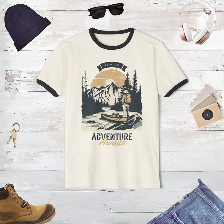 Gear up for your next grand adventure with our Outdoor Adventure T-Shirt! Perfect for every nature lover, this tee captures the spirit of the wild with its vibrant mountain themed design. Whether you're planning a night out, a weekend camping trip or a long hike through rugged terrains, this t-shirt is your ideal companion. Made with high-quality materials, it promises comfort and durability, making it a superb gift for the outdoorsy person in your life. Embrace the call of the wilderness and ad Custom Print Short Sleeve T-shirt For Outdoor, White Pre-shrunk T-shirt For Hiking, Short Sleeve T-shirt With Sublimation Print For Outdoor Activities, Outdoor Cotton Shirt With Sublimation Print, White Screen Print Adventure T-shirt, White Screen Print T-shirt For Adventure, Outdoor Cotton T-shirt With Sublimation Print, Outdoor Graphic Tee With Sublimation Print, White T-shirt For Outdoor Activities