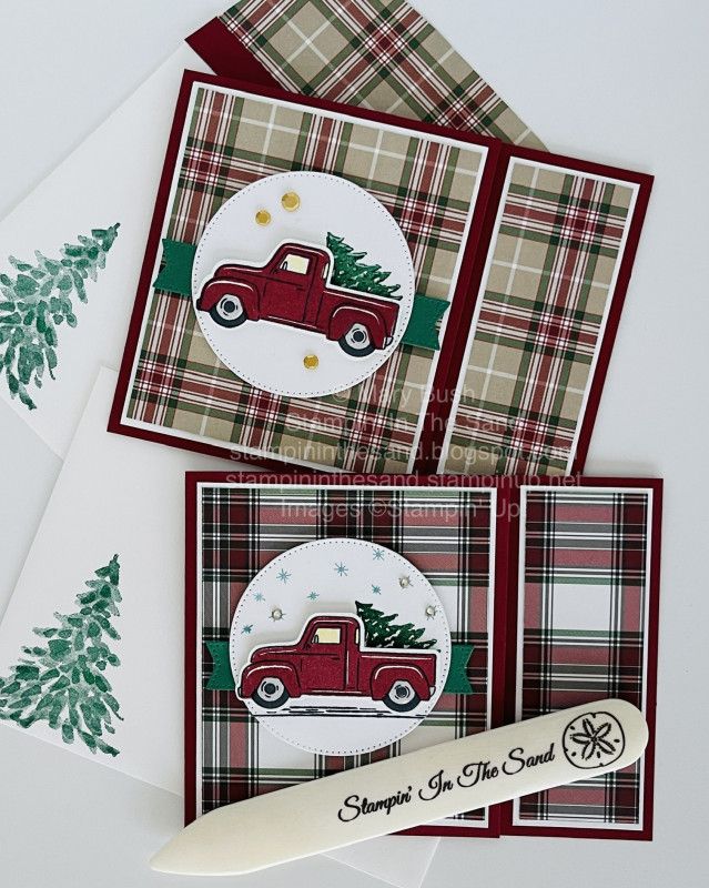 three christmas cards, one with a red truck and the other decorated with plaid