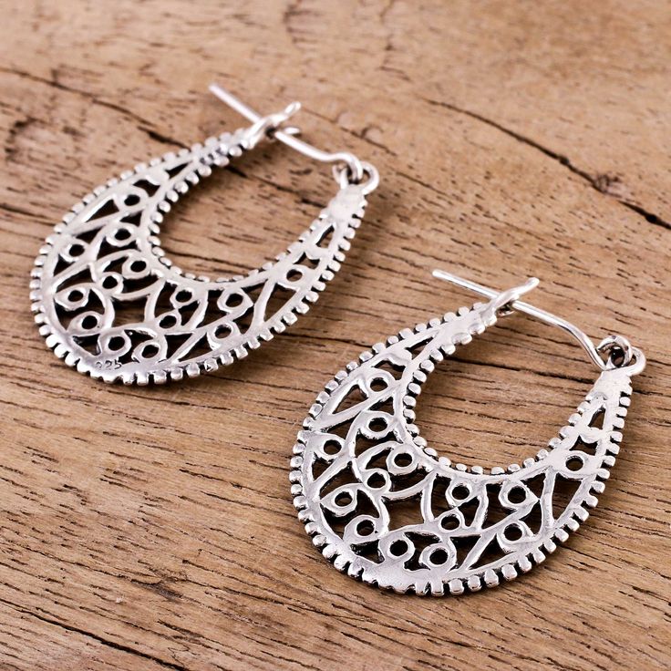 Crafted of sterling silver with intricate openwork, this pair of hoop earrings from India features gleaming vine motifs that spiral below the ears. Inspired by jali art and architecture, Indian artisan Neetu Barathi designs these earrings. Architecture Indian, Sterling Silver Hoop Earrings, Lovely Earrings, Sterling Silver Hoops, Jewelry Packaging, Jewelry Earrings Hoops, Silver Hoops, Silver Hoop Earrings, Jewelry Gift Box