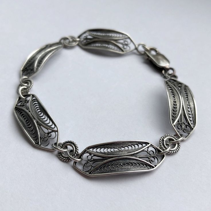 "Silver Bracelet Cadiz - Filigree Bracelet - Filigree Jewelry - Sterling Silver Bracelets - Silver Jewelry - Handmade Jewelry - Gift for Her Filigree - delicate jewellery technique made from silver or golden threads \"embroidering\" kind of metalwork lace that is specific to Spain, especially an Andalusian town Cordoba, where they call it a cordobese filigree. This craftsmanship has been passed from generation to generation, nonetheless nowadays there are very few craftsmen left who know to perf Classic Adjustable Bracelet With Intricate Design, Adjustable Filigree Bangle Bracelet, Traditional Adjustable Filigree Bracelets, Adjustable Traditional Filigree Bracelets, Classic Metal Bracelet With Intricate Design, Ornate Etched Adjustable Bracelets, Ornate Adjustable Bracelets As Gifts, Ornate Adjustable Nickel-free Bracelets, Ornate Adjustable Nickel Free Bracelet