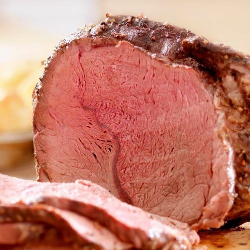 a piece of meat sitting on top of a cutting board