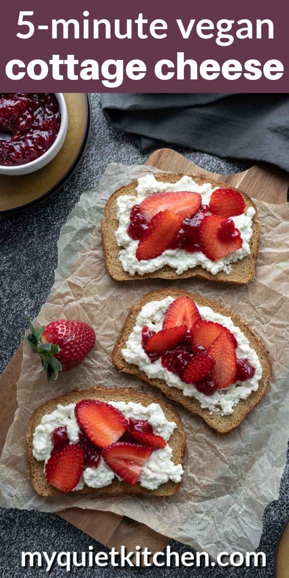 three pieces of bread with cream cheese and strawberries on top