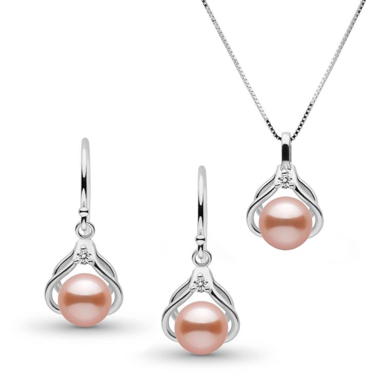 Our tiara collection pendant, set with a single 0.03 cttw VS1-G diamond, is paired with the matching earrings featuring sparkling 0.06 cttw VS1-G rated diamonds, a grade typically reserved for diamond solitaire jewelry. Both pieces are set with lustrous 6.5-7.0 mm Freshadama freshwater pearls. Freshadama pearls are sorted highest .01% of the freshwater pearl harvest each year. These pearls are exceptionally difficult to collect, and we've been proudly offering them for decades through our exclus Elegant Rose Gold Jewelry Sets With Diamond Accents, Elegant Rose Gold Diamond Jewelry Sets, Elegant Pendant Jewelry Sets, White Gold Pendant Jewelry Sets For Anniversaries, Elegant White Gold Teardrop Jewelry Sets, White Gold Pendant Jewelry Set For Anniversary, Elegant Silver Jewelry Sets With Prong Setting, Elegant Formal Jewelry Sets With Pendant, Elegant Pendant Jewelry Sets For Formal Occasions