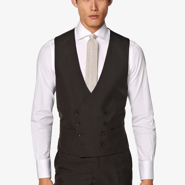 This refined double-breasted waistcoat is tailored slim with an 8-on-2 closure from a wool silk linen blend. Fitted Double-breasted Three-piece Suit For Semi-formal, Classic V-neck Suits For Semi-formal Occasions, Classic V-neck Semi-formal Suits, Fitted Double-breasted Business Suit, Fitted Double-breasted Three-piece Suit For Work, Tailored V-neck Blazer For Business, Sleeveless Business Outerwear With Button Closure, Formal Fitted Three-piece Suit With Double-breasted Fastening, Fitted Double-breasted Business Casual Suit