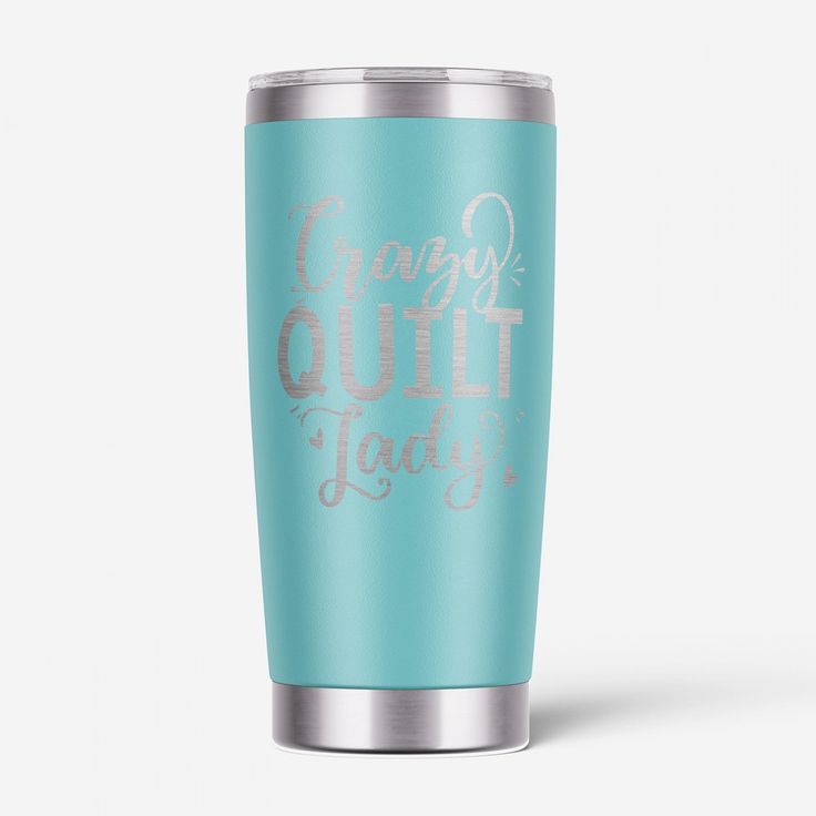 a blue tumbler cup with the words crazy quilt lady on it's side